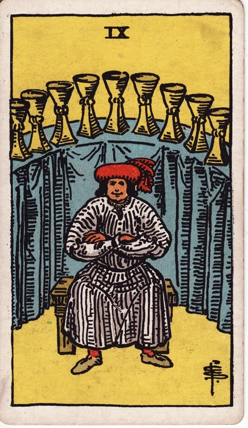 Nine of Cups from the historical Rider–Waite–Smith deck