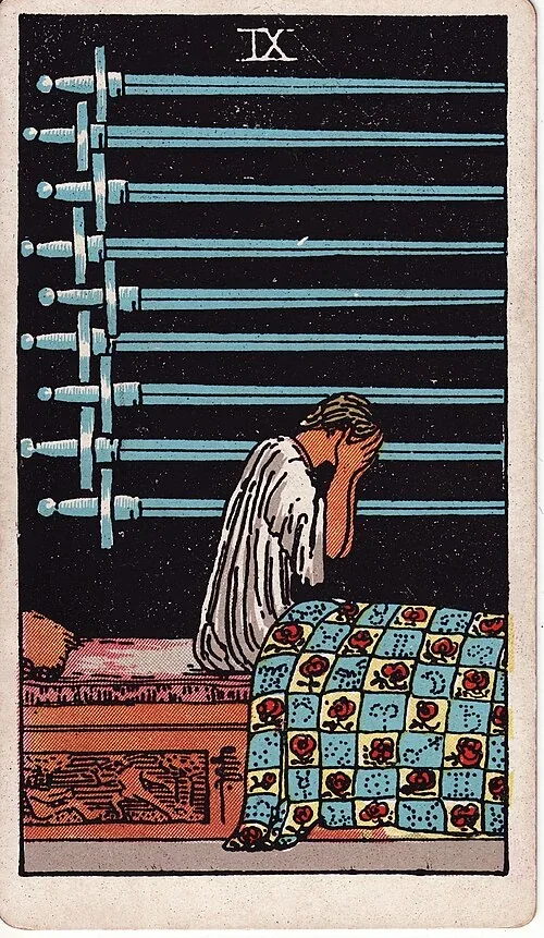 Nine of Swords from the historical Rider–Waite–Smith deck