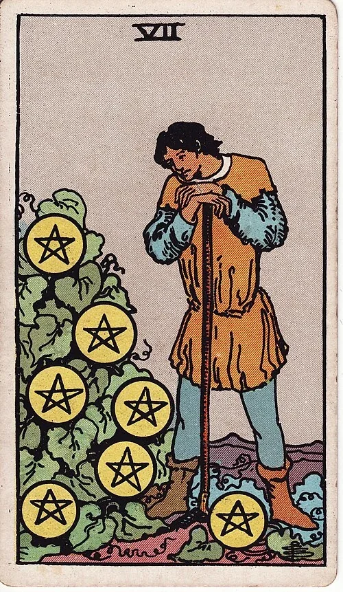 Seven of Pentacles from the historical Rider–Waite–Smith deck